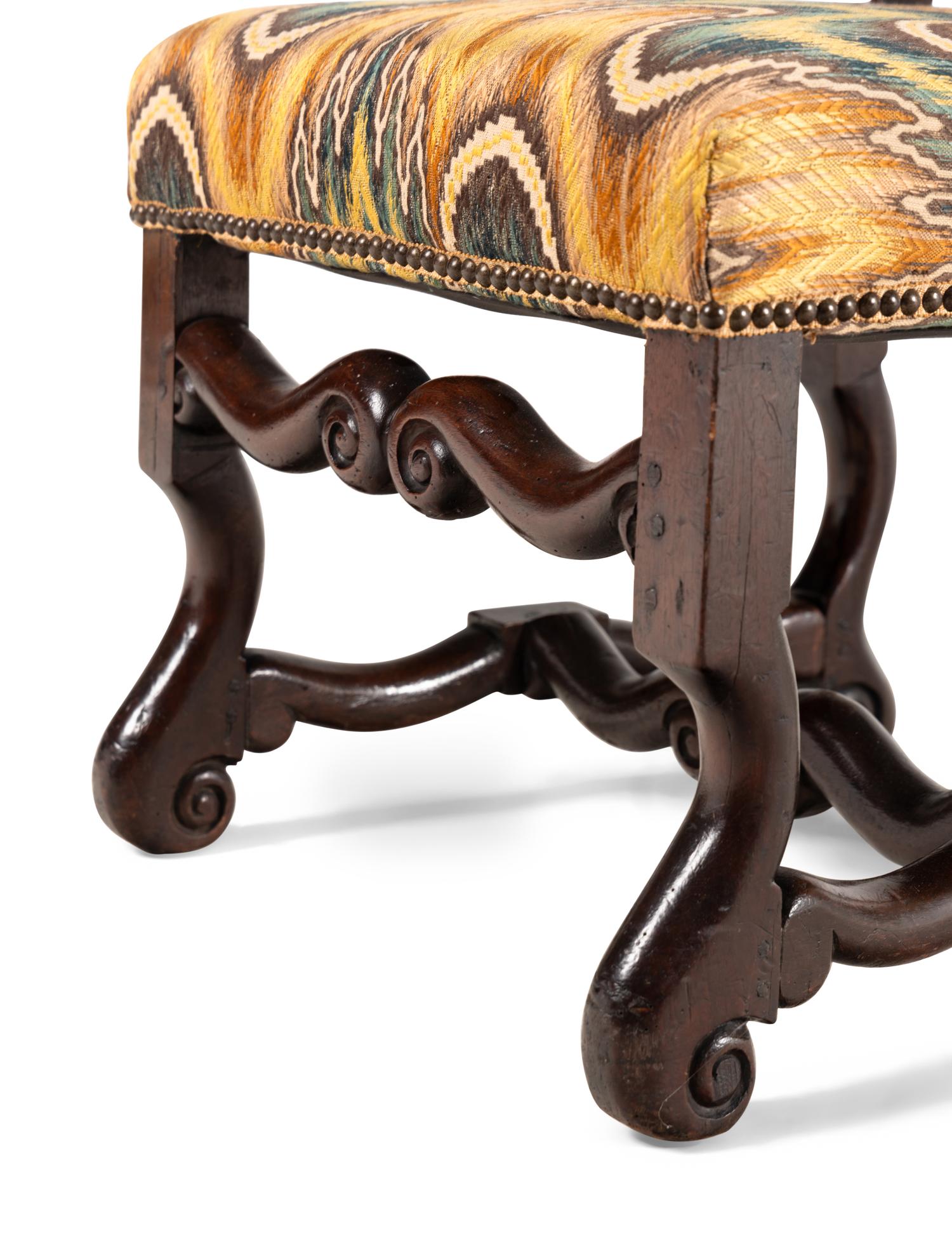A Pair of Louis XIV Walnut Side Chairs