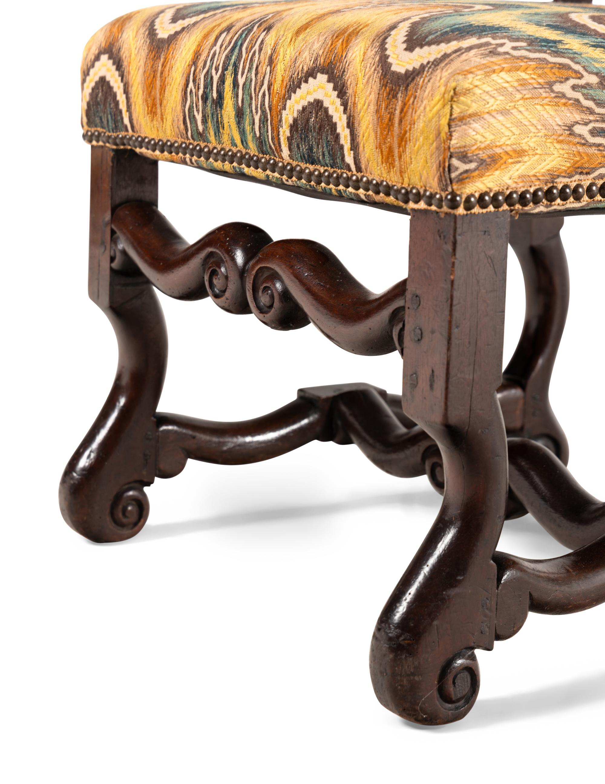 A Pair of Louis XIV Walnut Side Chairs