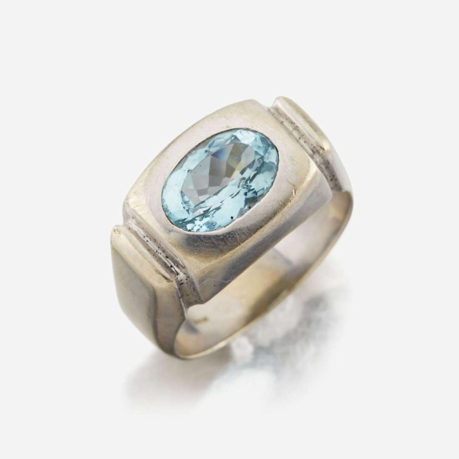 A fourteen karat white gold contemporary aquamarine ring