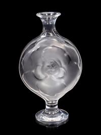A Lalique Perfume Bottle and Three Lalique Fish