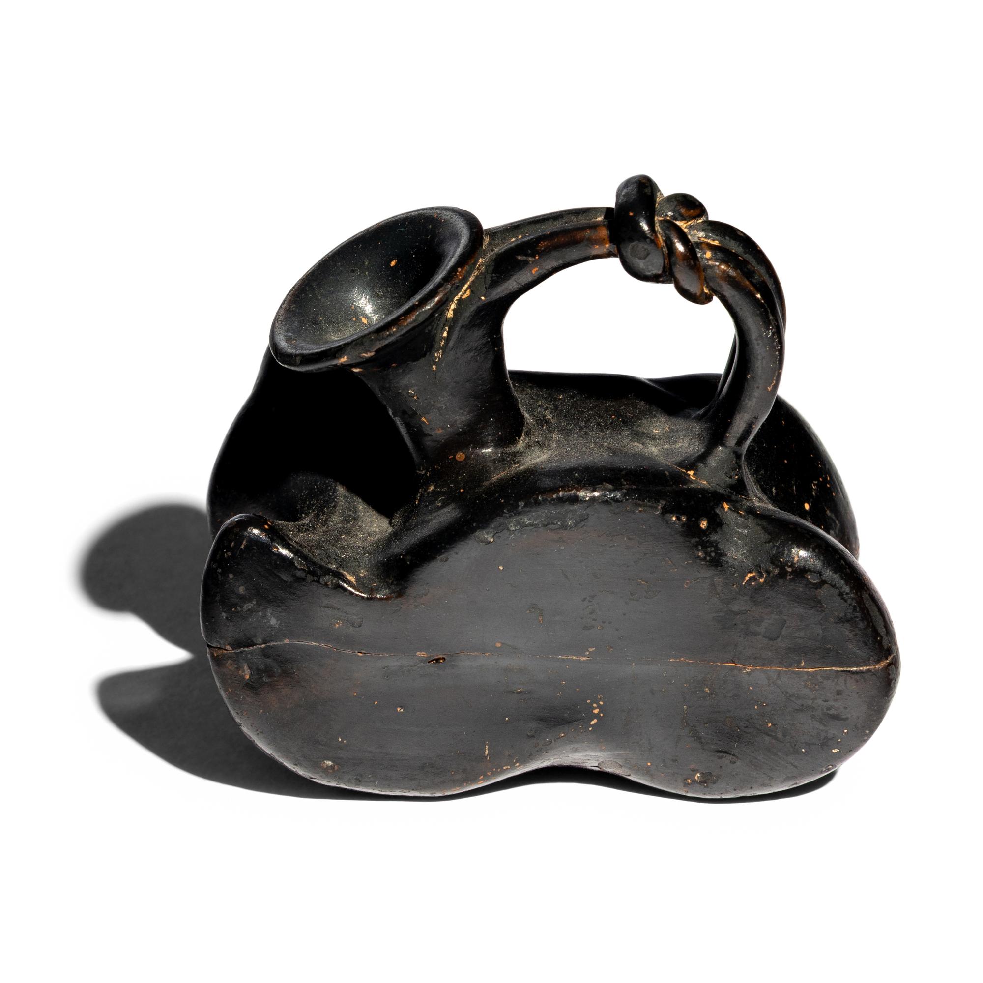 A Greek Black-Glazed Figural Askos