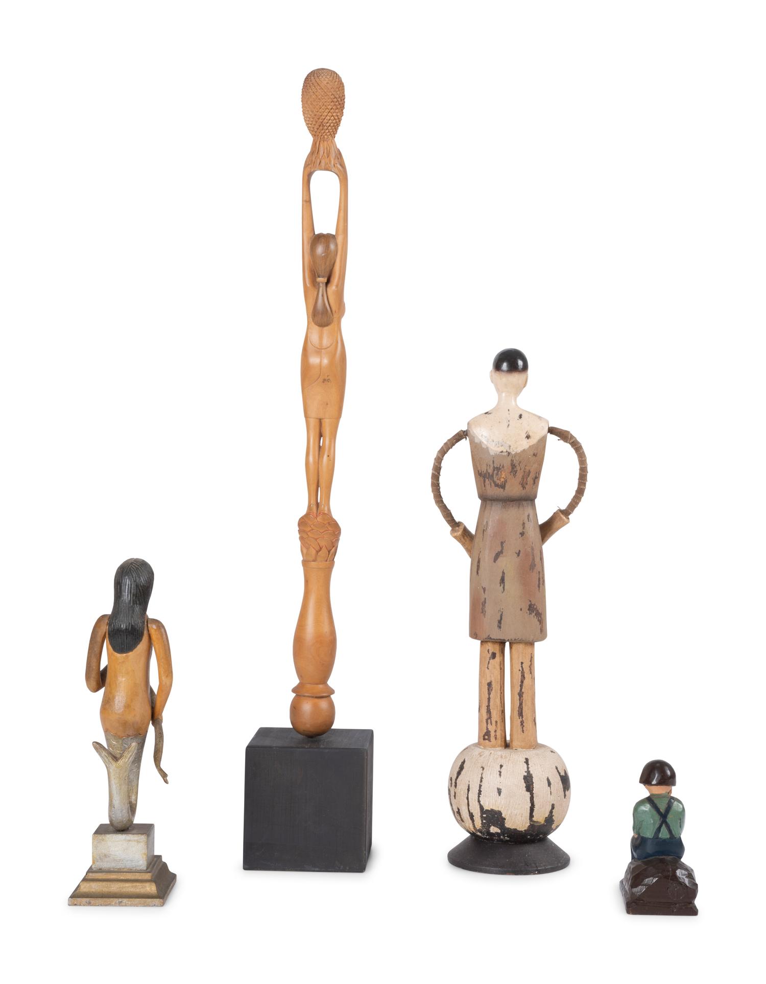 Four Carved and Painted Wooden Folk Art Figures