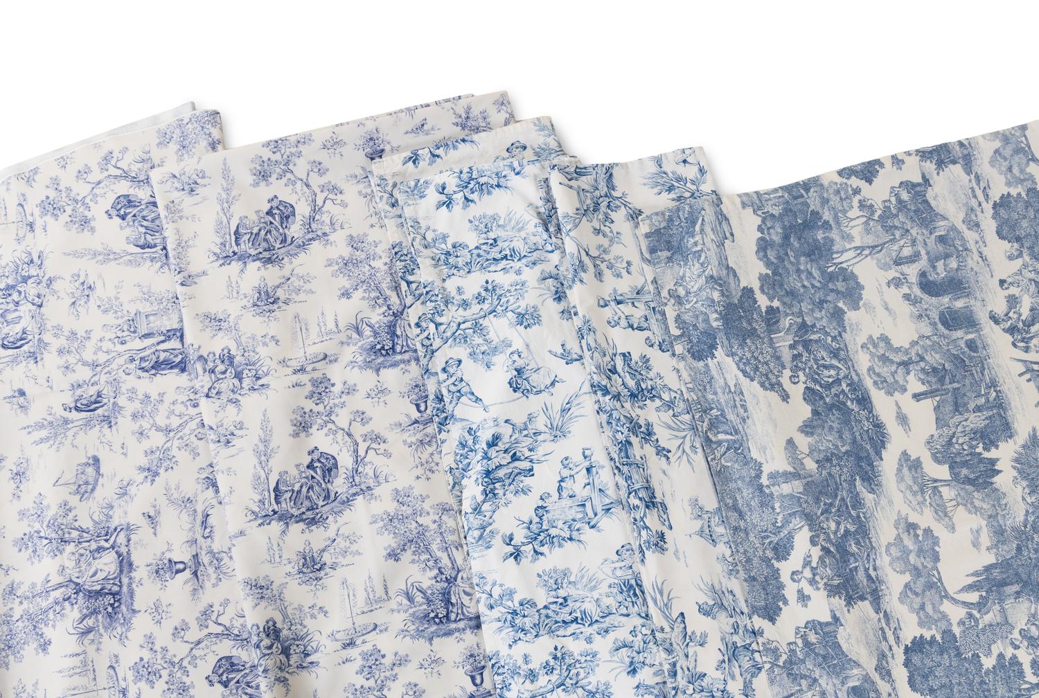 A Group of Blue Toile Tablecloths