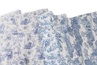 A Group of Blue Toile Tablecloths