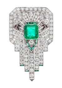 An Art Deco Platinum, Emerald, Diamond, and Multigem Clip Brooch, 8.90 dwts.
