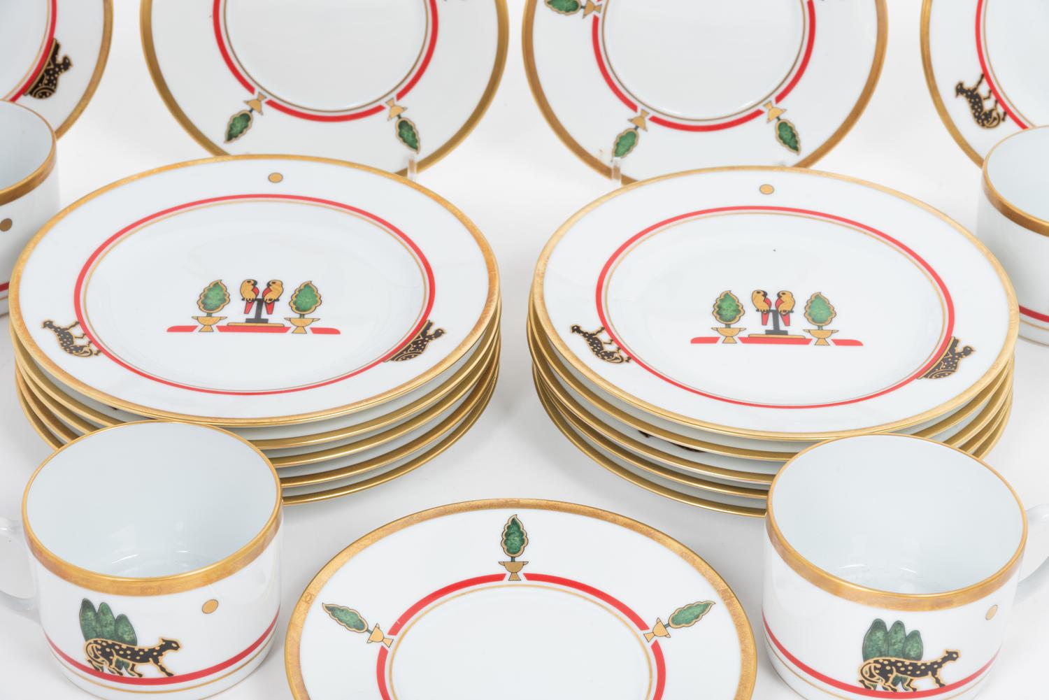 A Cartier La Maison de Louis Porcelain Dinner Service for Twelve