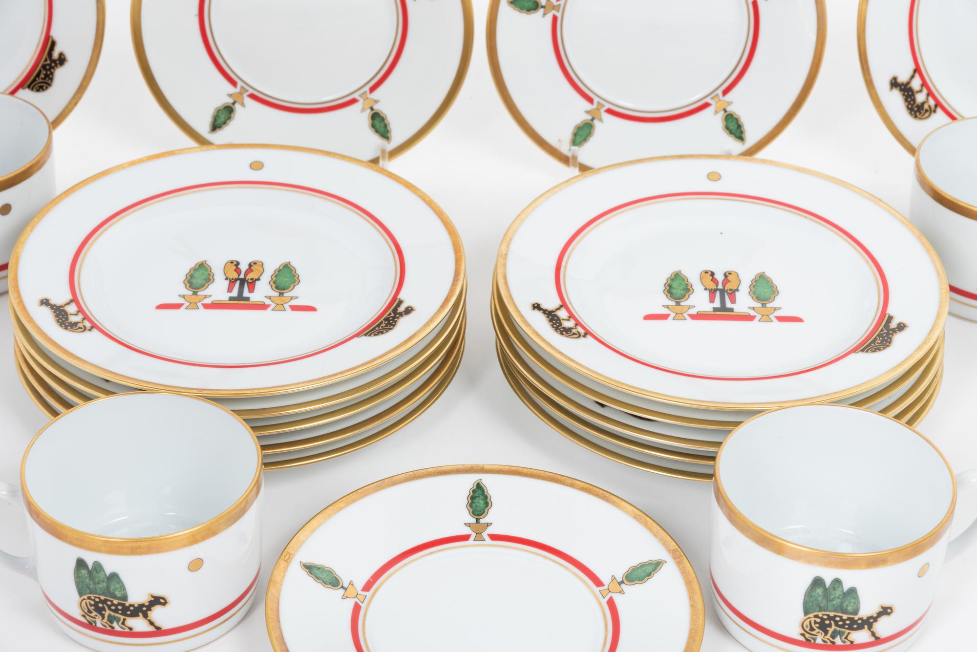 A Cartier La Maison de Louis Porcelain Dinner Service for Twelve