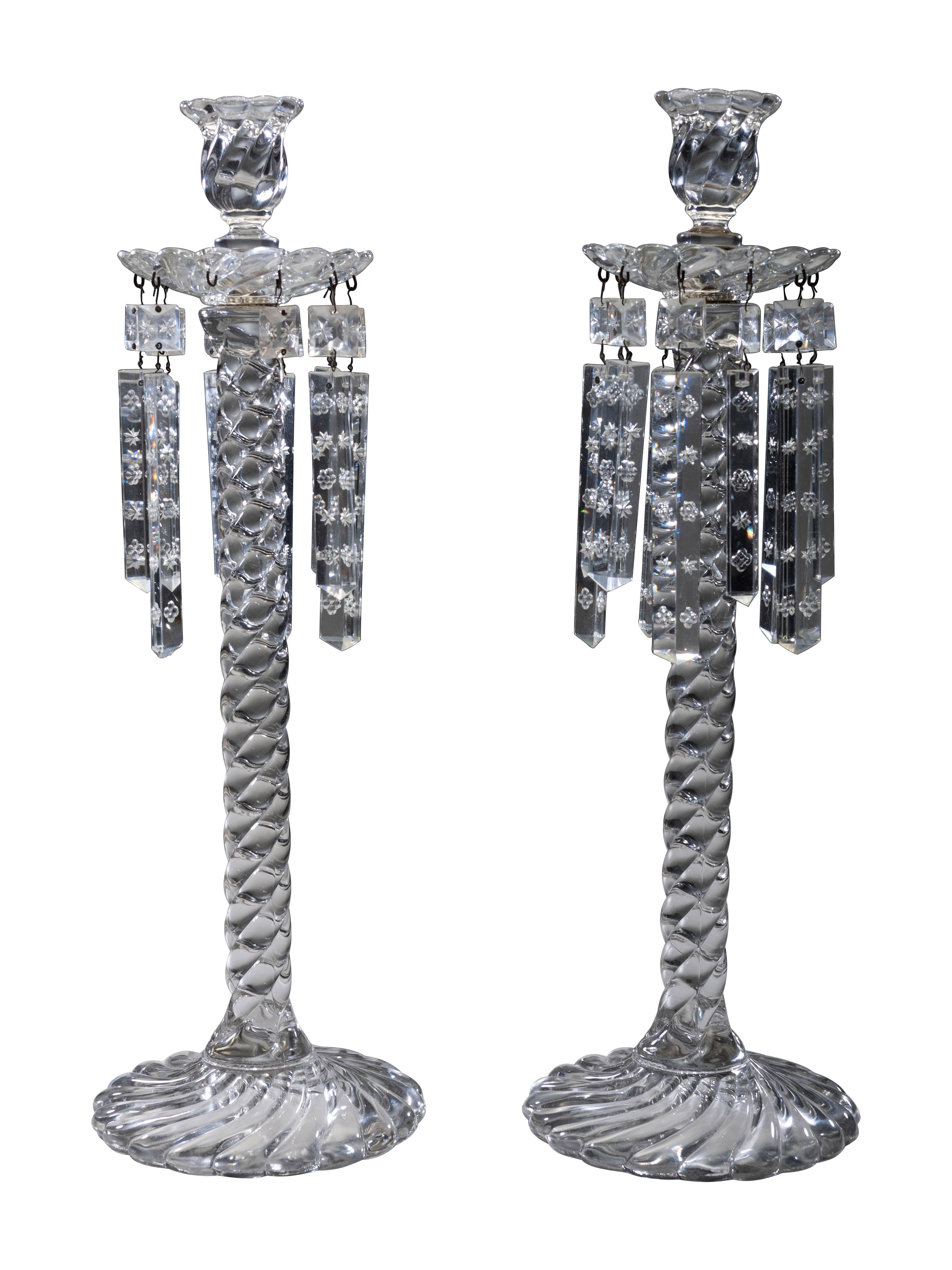 A Pair of Molded Twist Glass Candle Holders