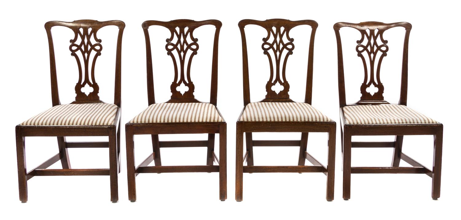 A Set of Four Chippendale Style Mahogany Dining Chairs Height 38 1/2 inches. — 19TH CENTURY