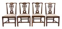 A Set of Four Chippendale Style Mahogany Dining Chairs Height 38 1/2 inches. — 19TH CENTURY