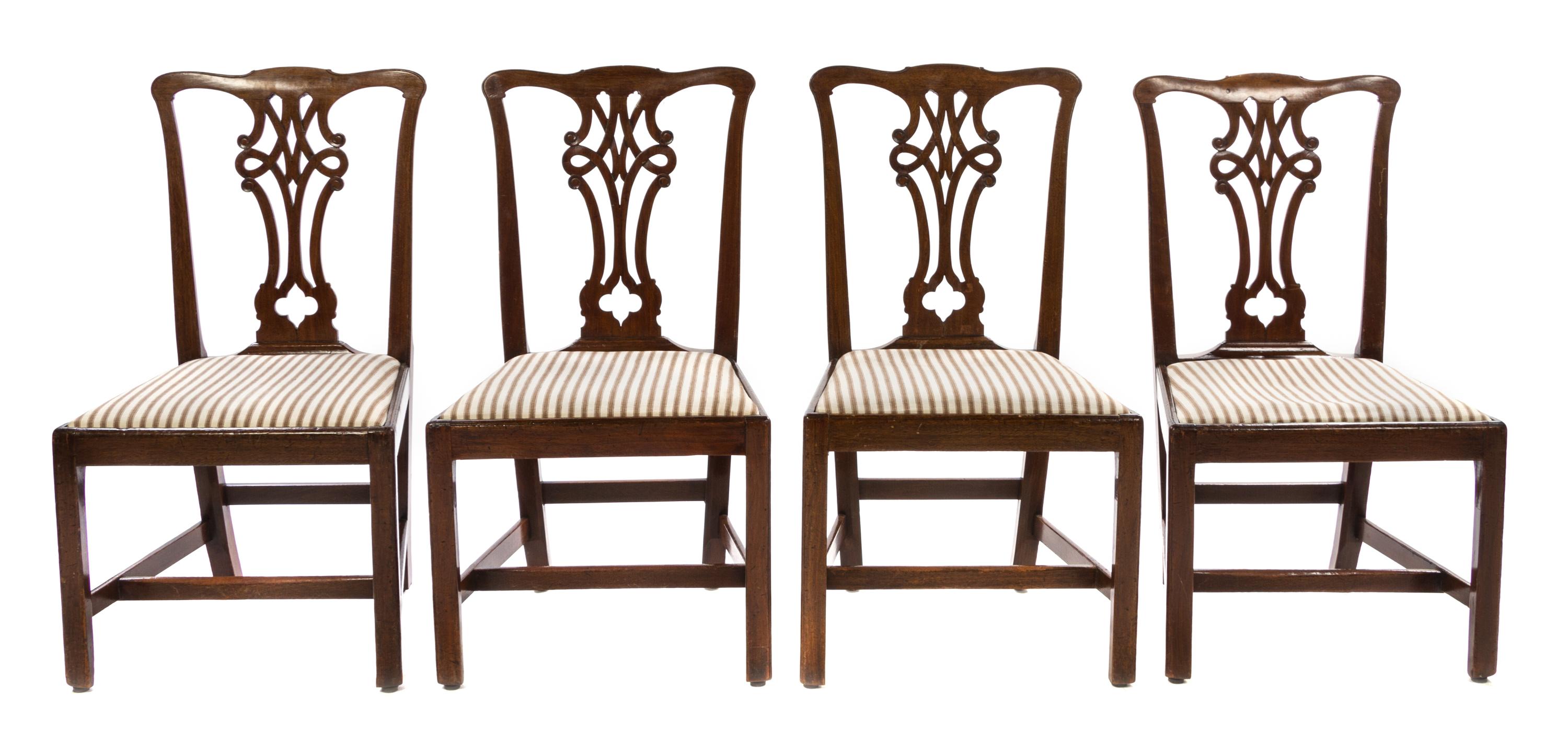 A Set of Four Chippendale Style Mahogany Dining Chairs Height 38 1/2 inches. — 19TH CENTURY