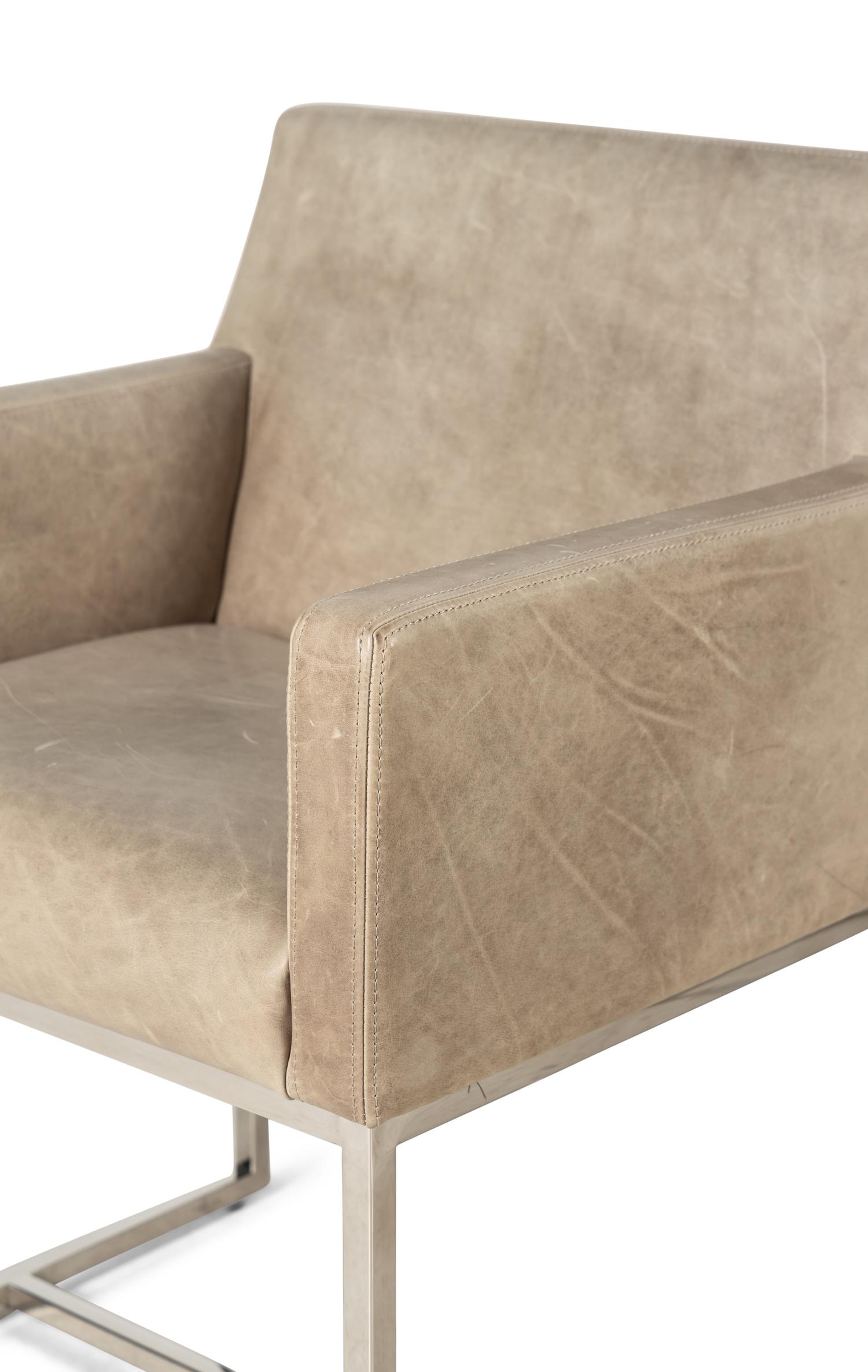 A Set of Six Contemporary Leather-Upholstered Armchairs