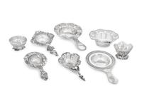A Group of Five Silver Tea Strainers
