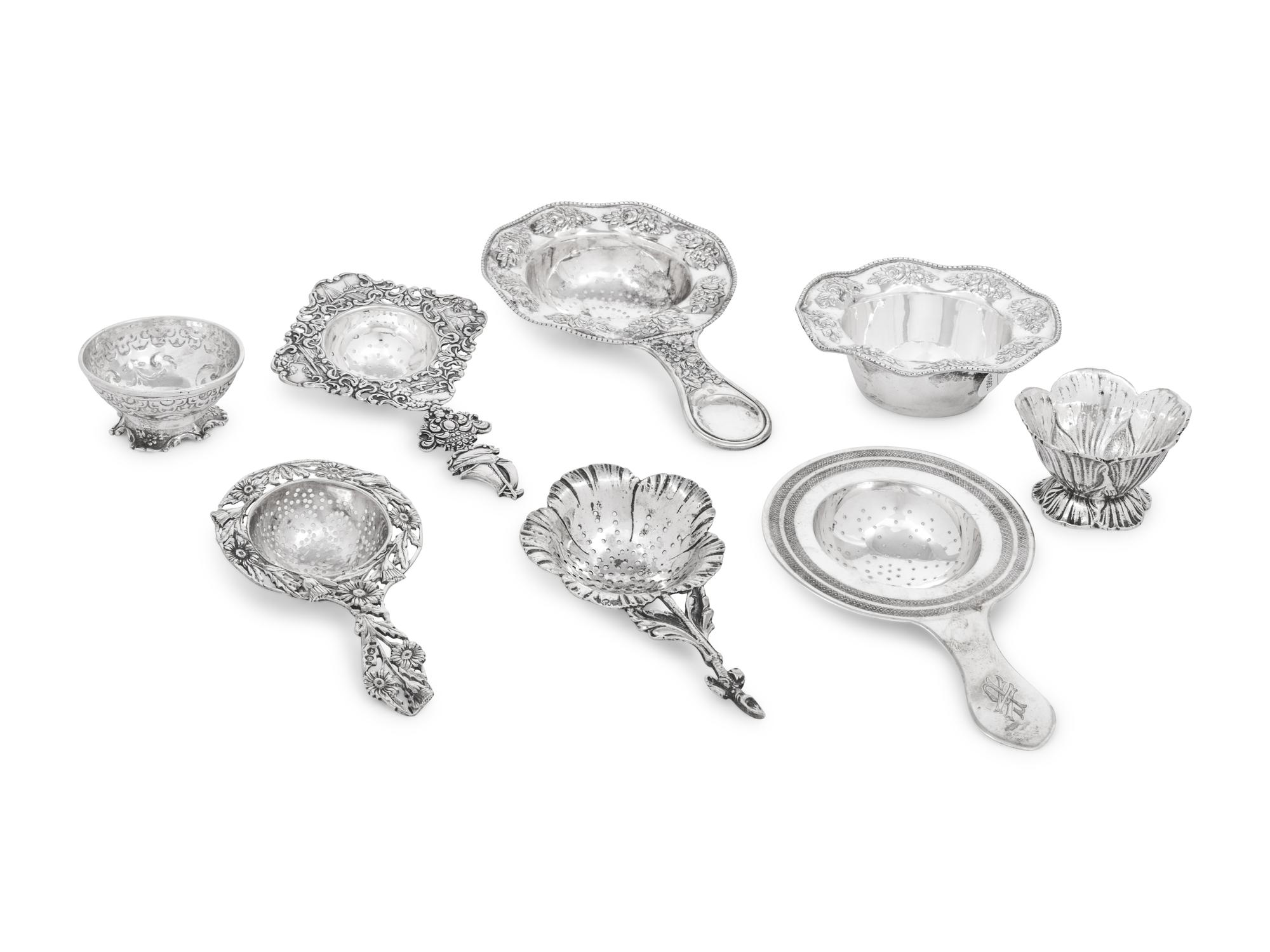 A Group of Five Silver Tea Strainers