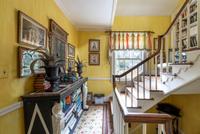 An Italian Neoclassical Gray-Painted and Parcel Gilt Console Table with Marble Top