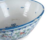 A Dutch Delft Polychrome Glazed Earthenware Punch Bowl