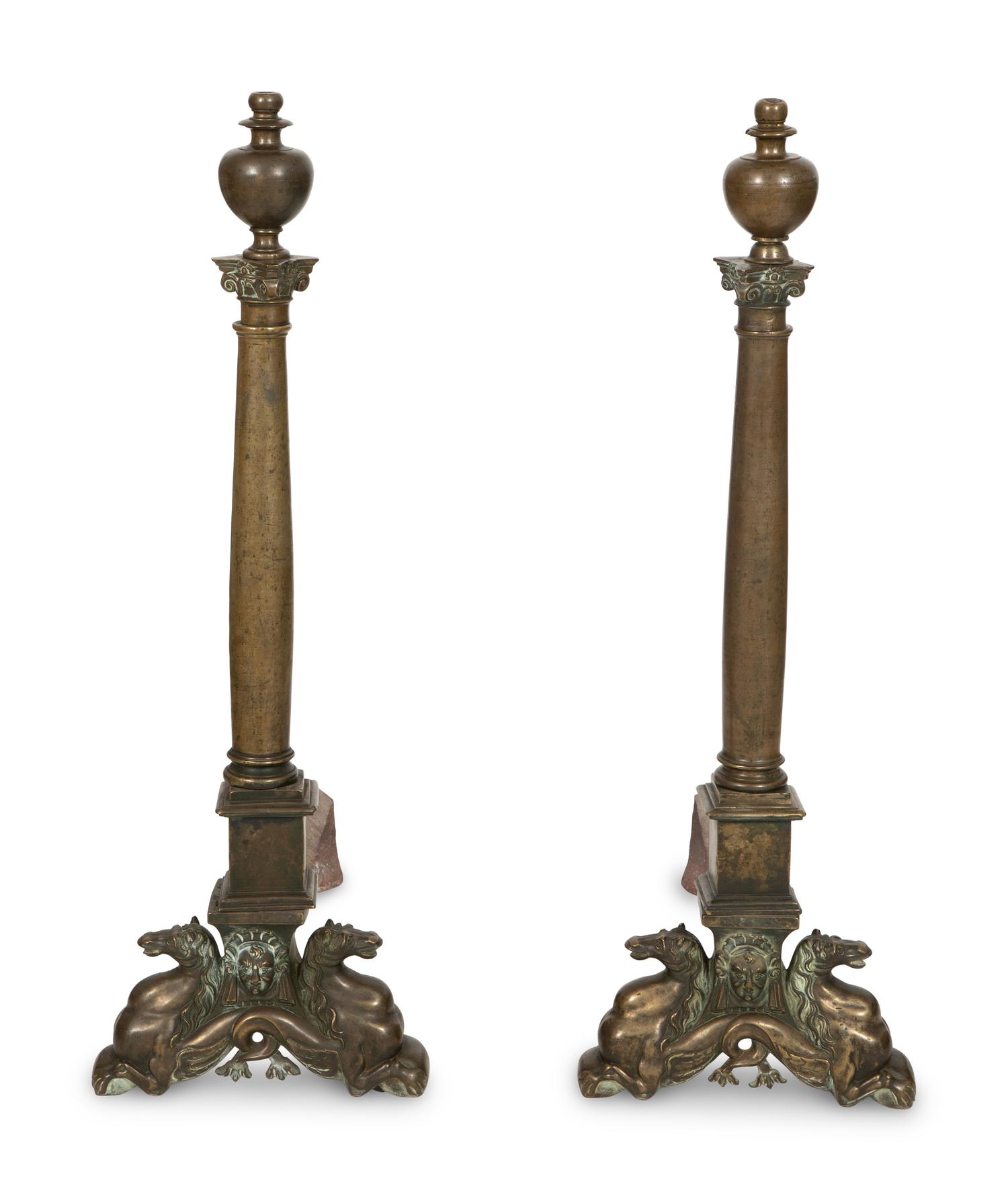 A Pair of Large Patinated Metal Andirons