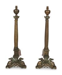 A Pair of Large Patinated Metal Andirons
