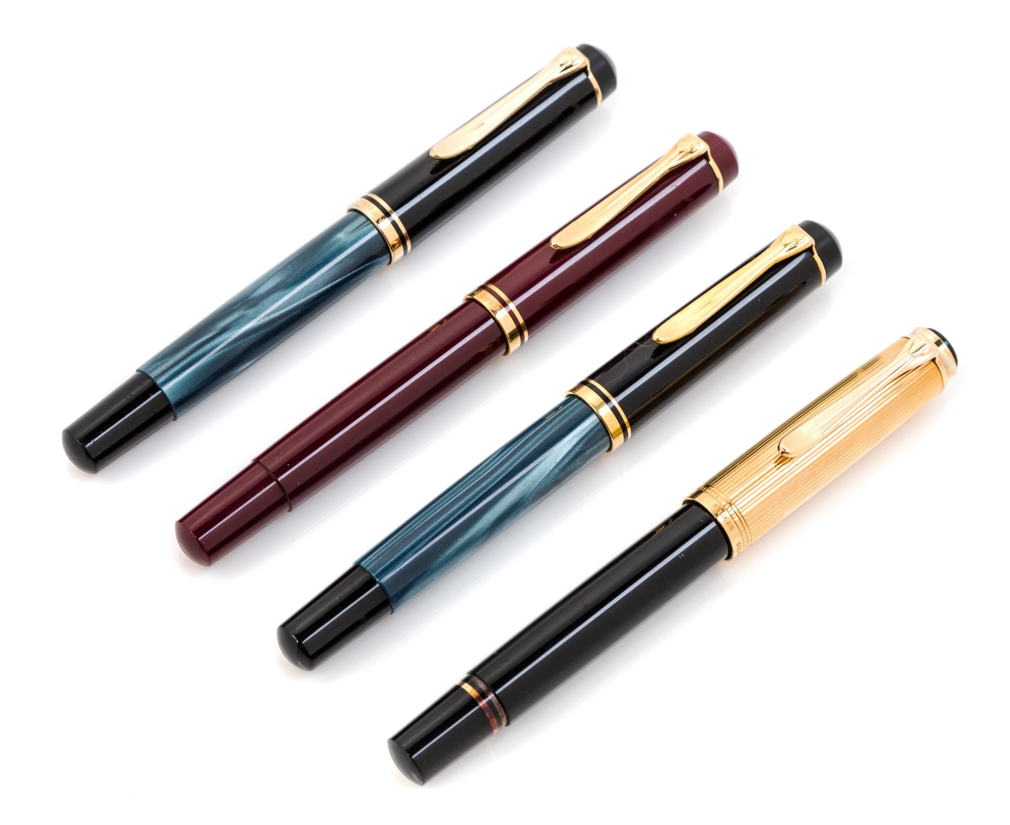 A Collection of Four Pelikan Souveran M400 Fountain Pens Length of each 5 inches.