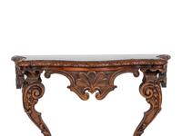 An Italian Baroque Style Console Table and Mirror