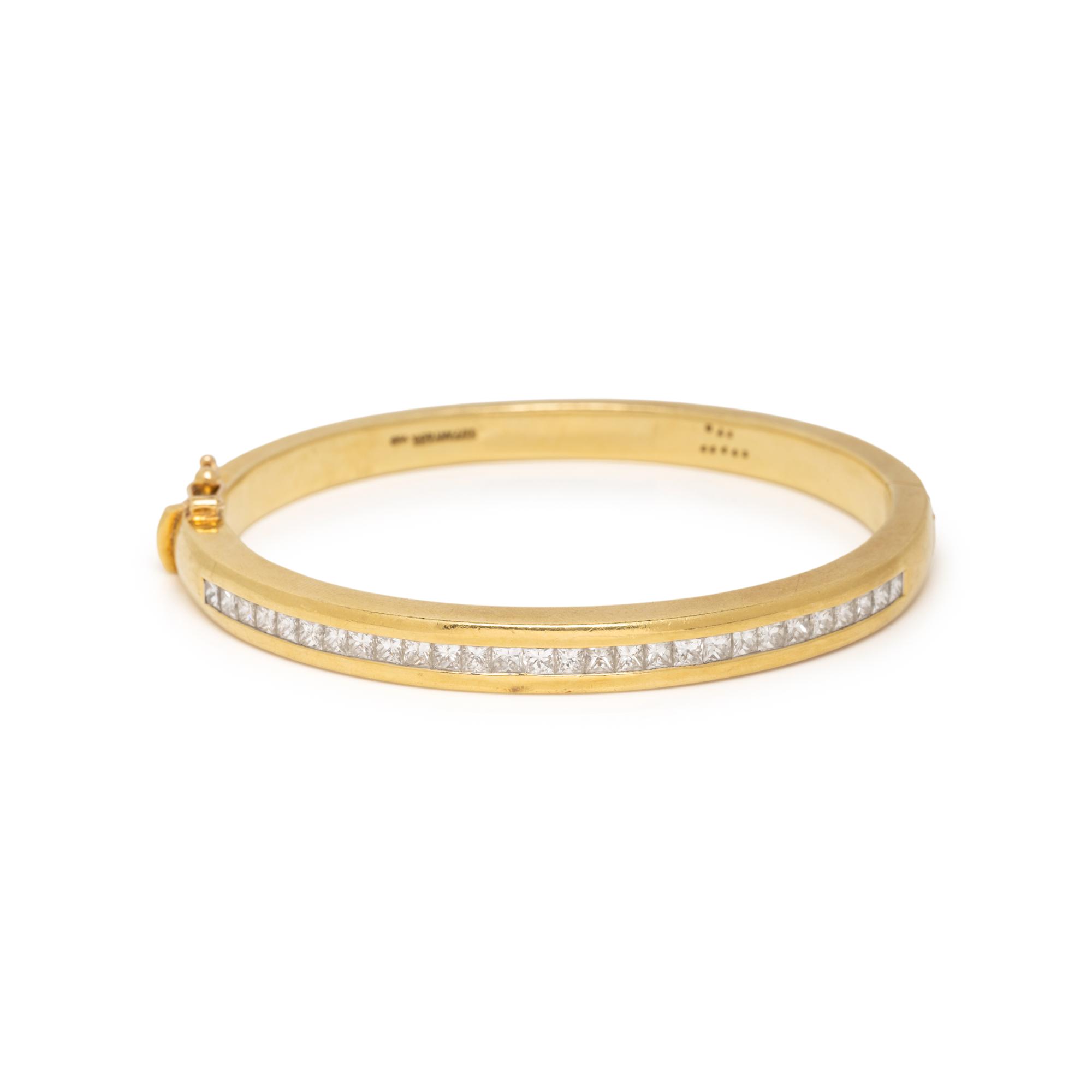 TIFFANY & CO., YELLOW GOLD AND PRINCESS CUT DIAMOND BANGLE BRACELET