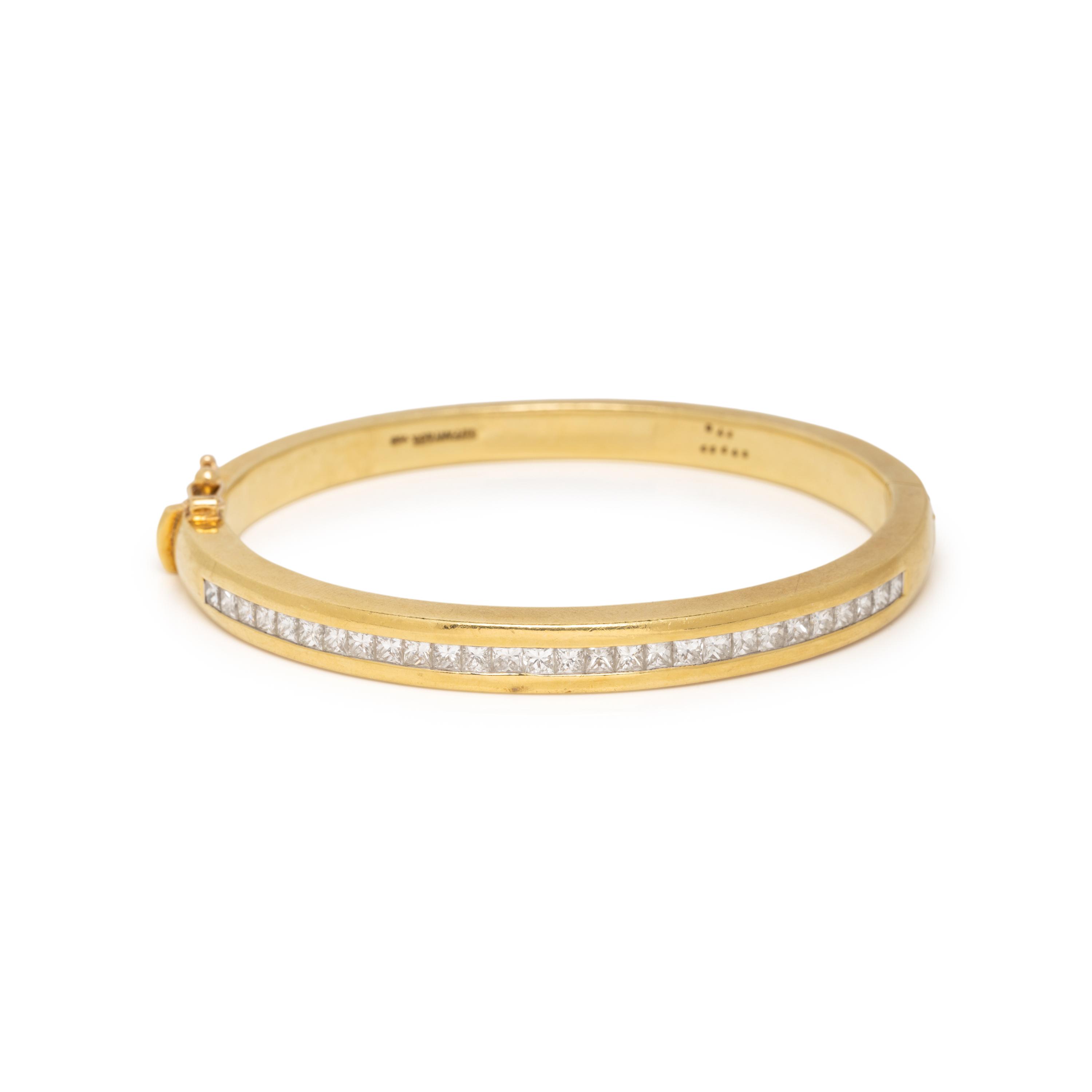 TIFFANY & CO., YELLOW GOLD AND PRINCESS CUT DIAMOND BANGLE BRACELET