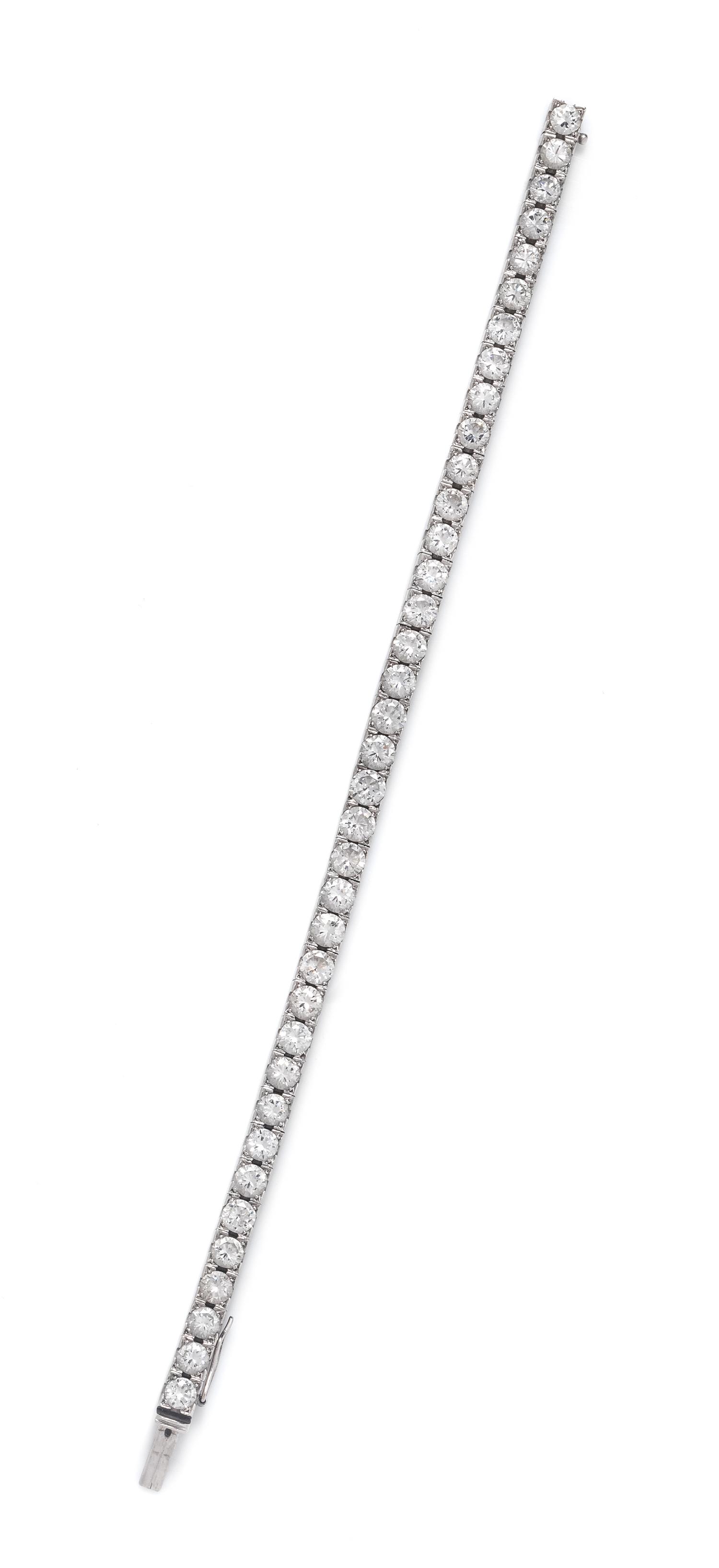 A Platinum and Diamond Line Bracelet,
