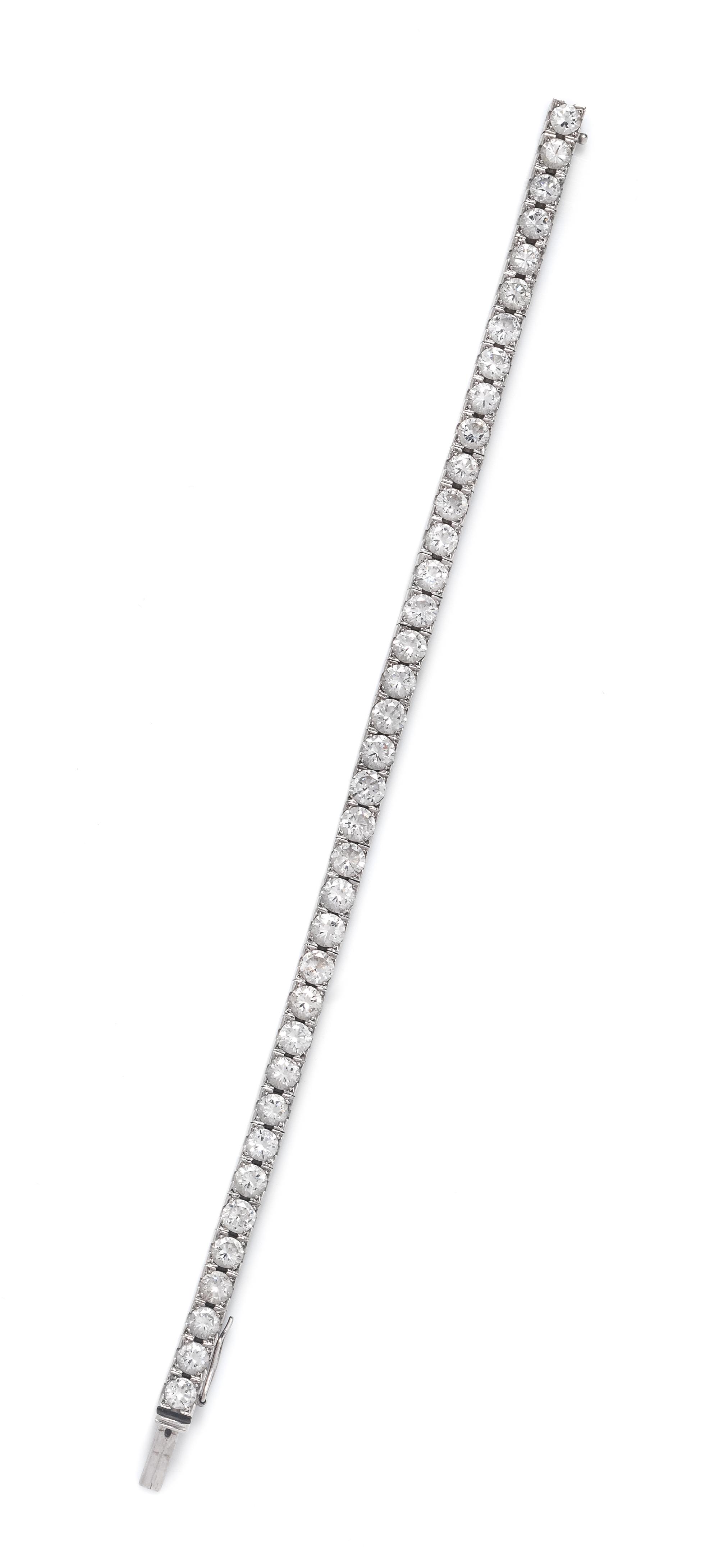 A Platinum and Diamond Line Bracelet,