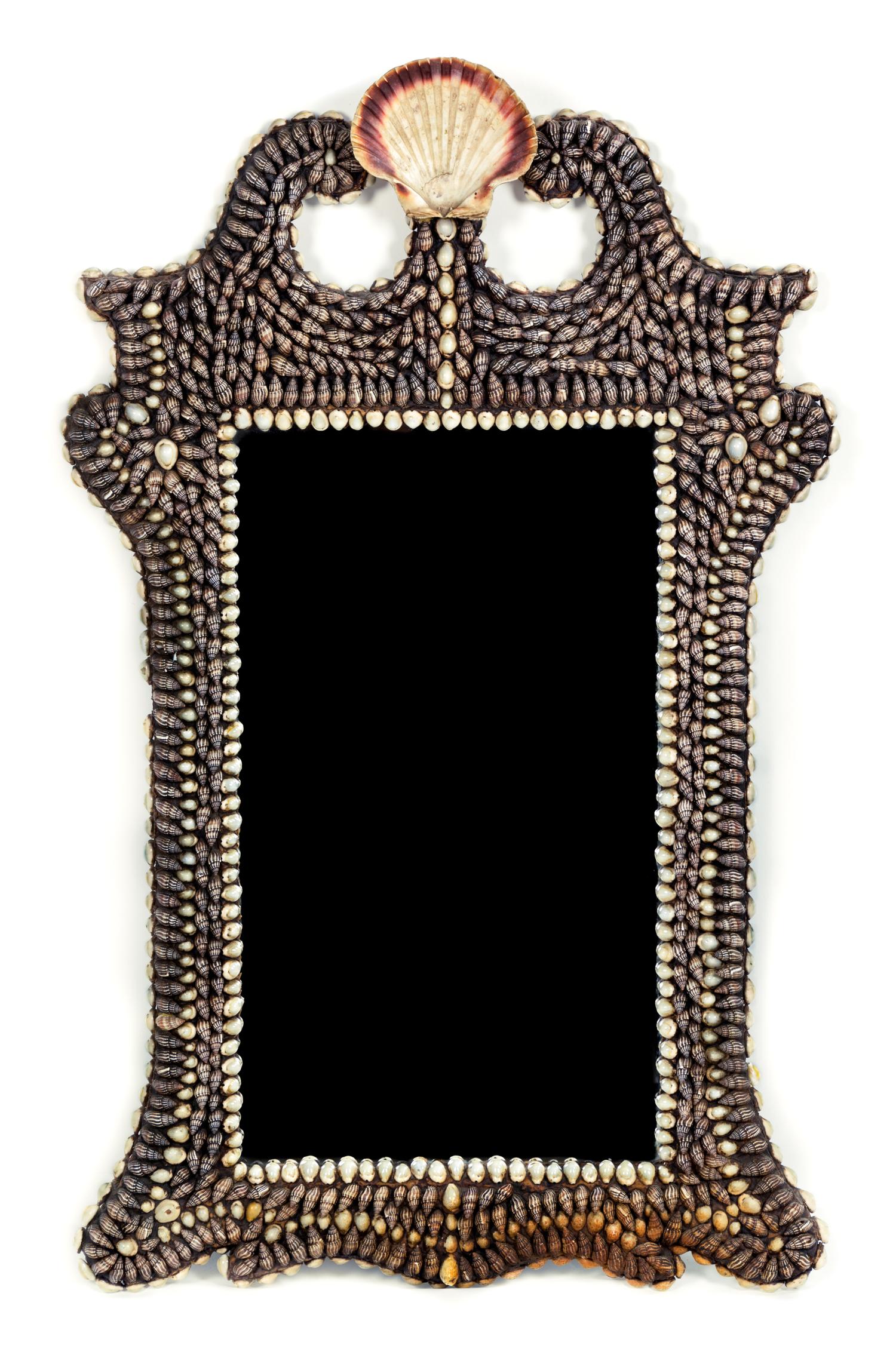 A Shell-Encrusted Mirror 38 x 23 inches. — 20TH CENTURY