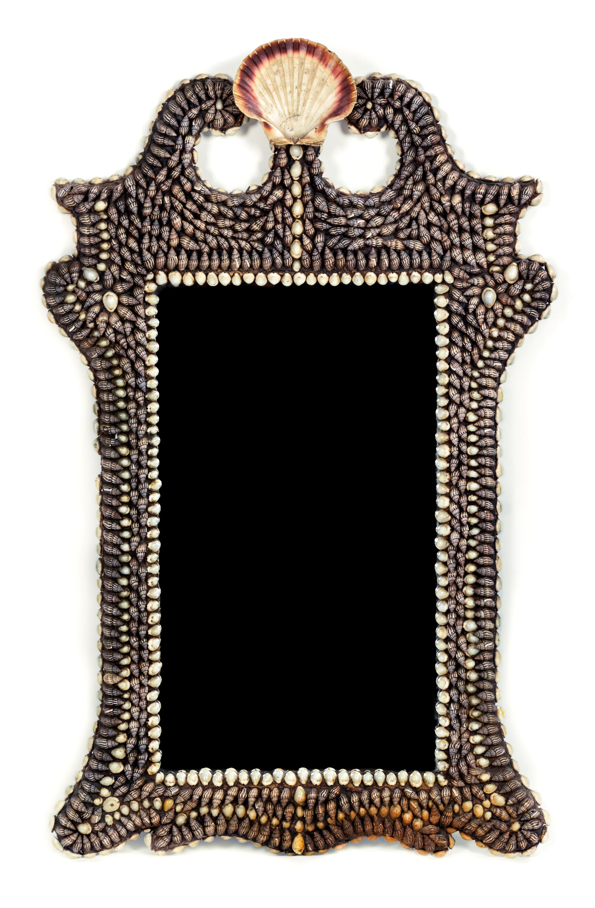 A Shell-Encrusted Mirror 38 x 23 inches. — 20TH CENTURY