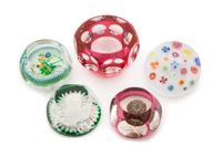 A Collection of Five Glass Paperweights Diameter of largest 3 inches