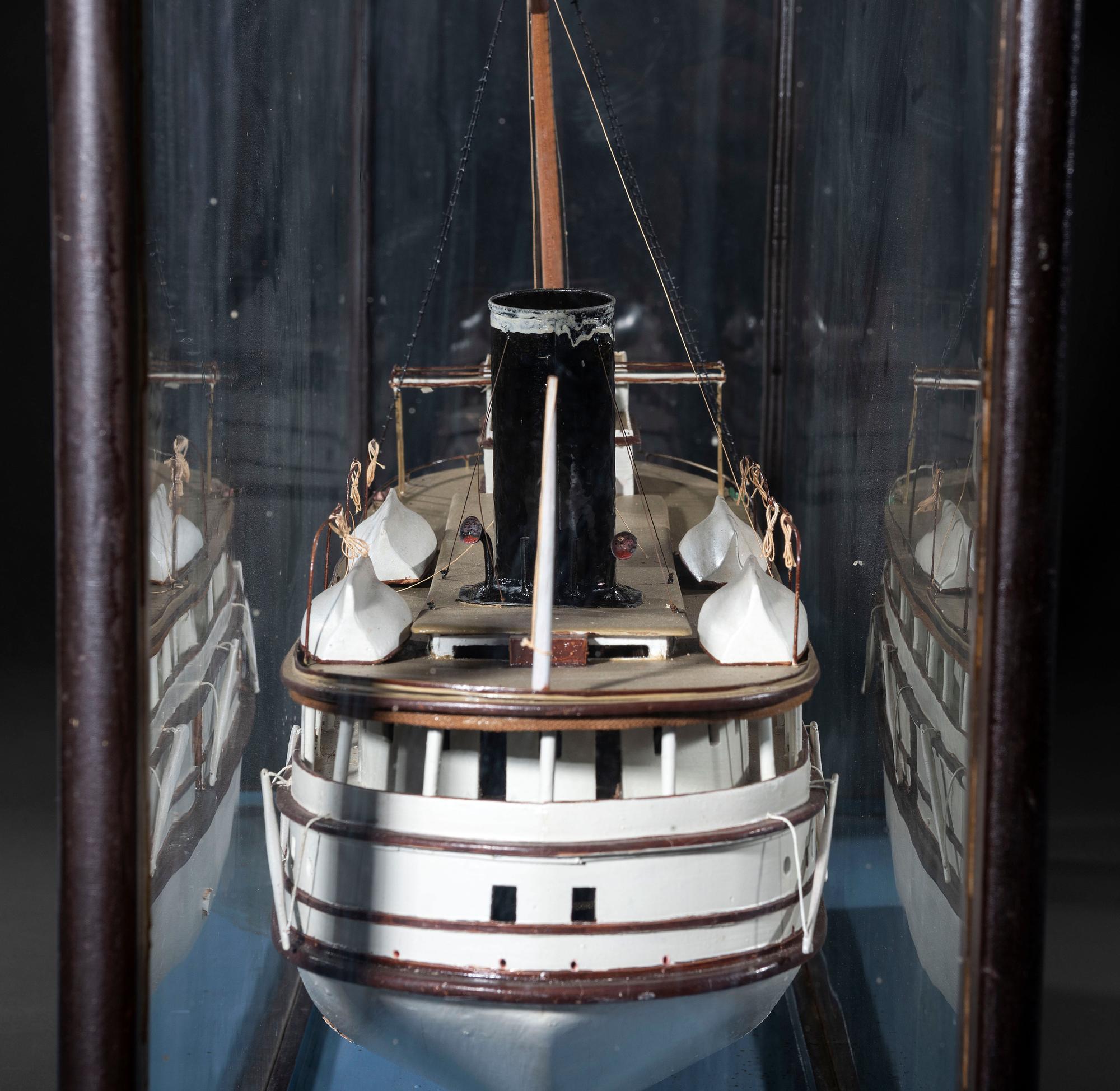 A Painted Wood Cased Steamboat Model