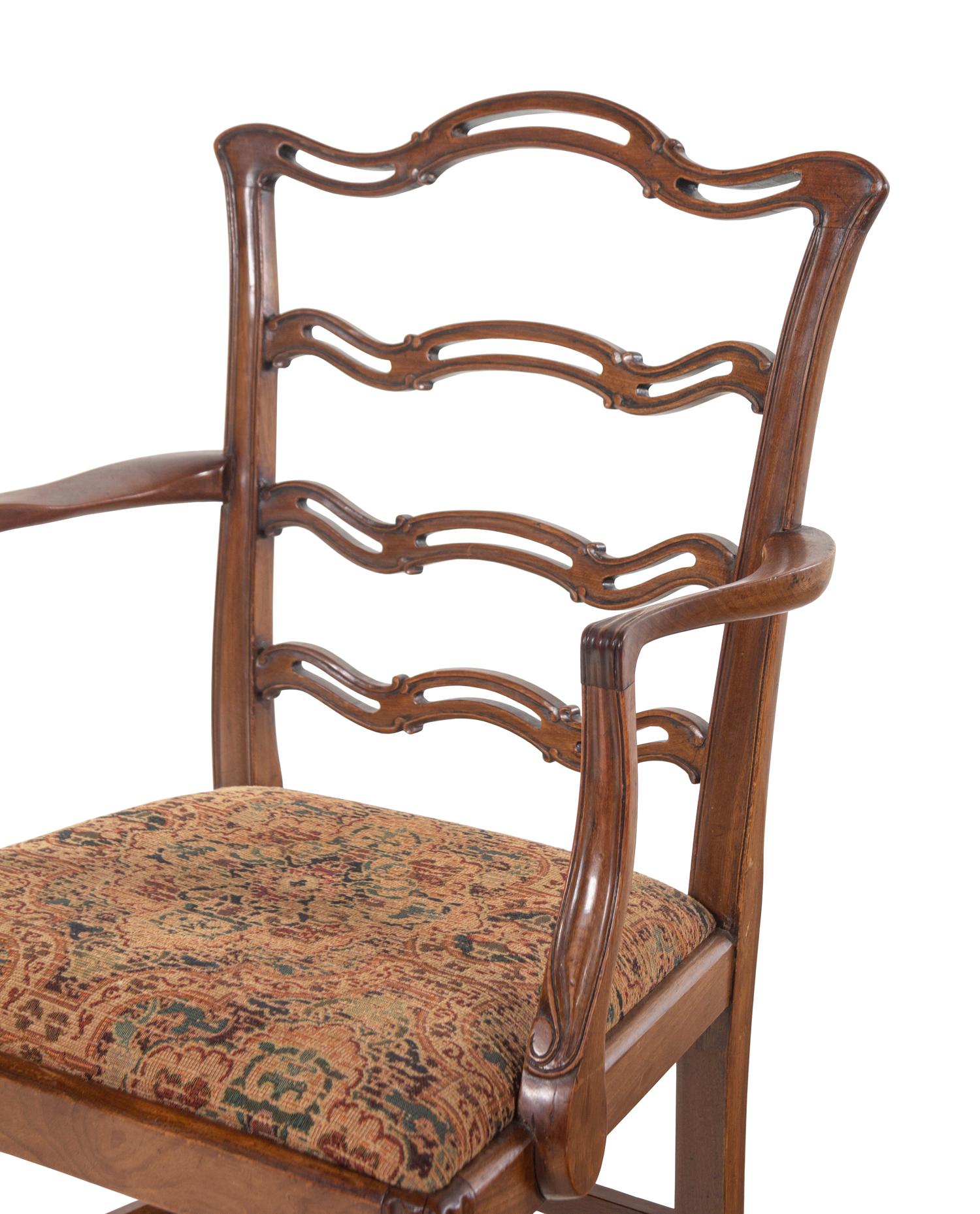 A Set of Eight George III Style Mahogany Chairs
