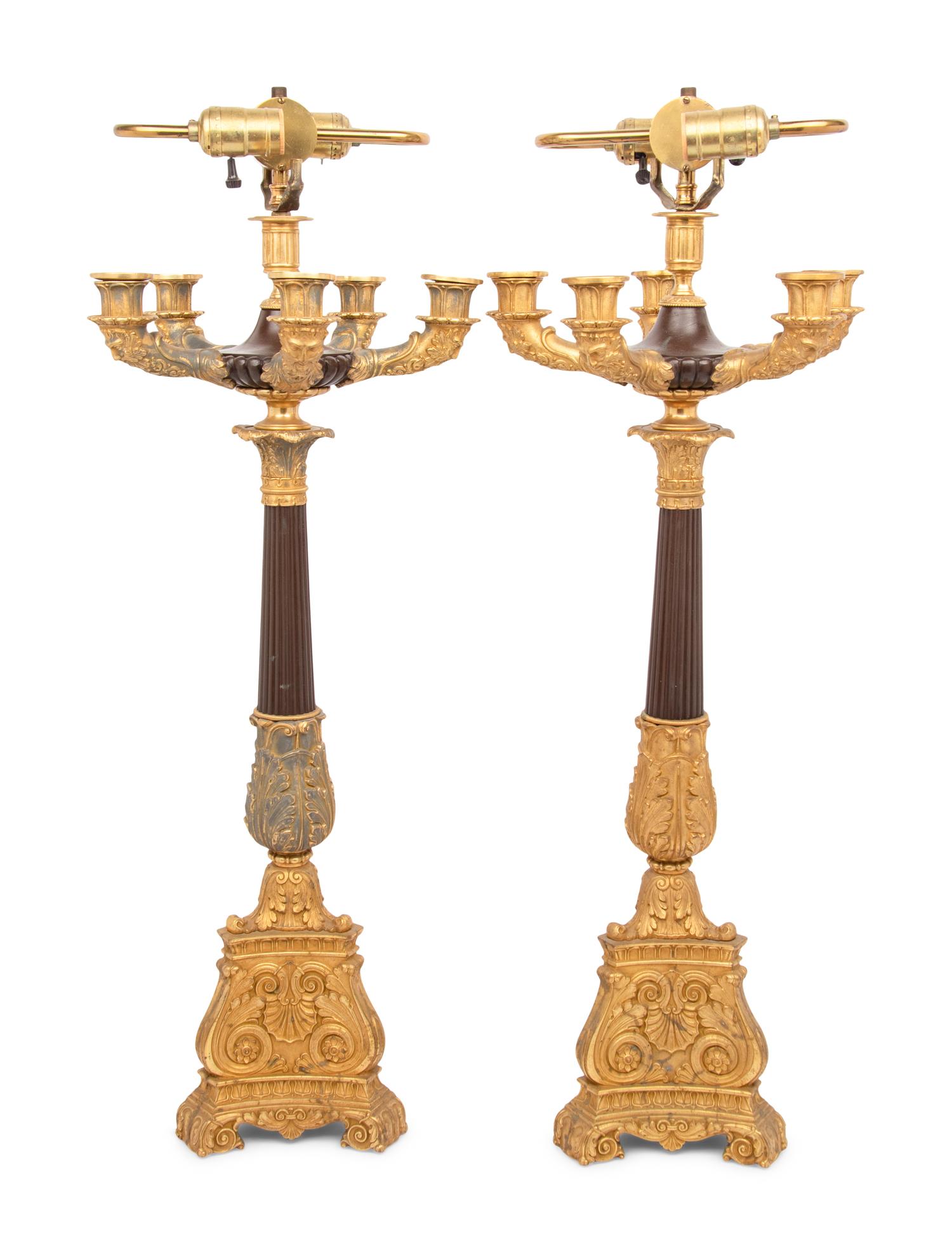 A Pair of Louis-Philippe Gilt and Patinated Bronze Five-Light Candelabra