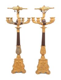 A Pair of Louis-Philippe Gilt and Patinated Bronze Five-Light Candelabra