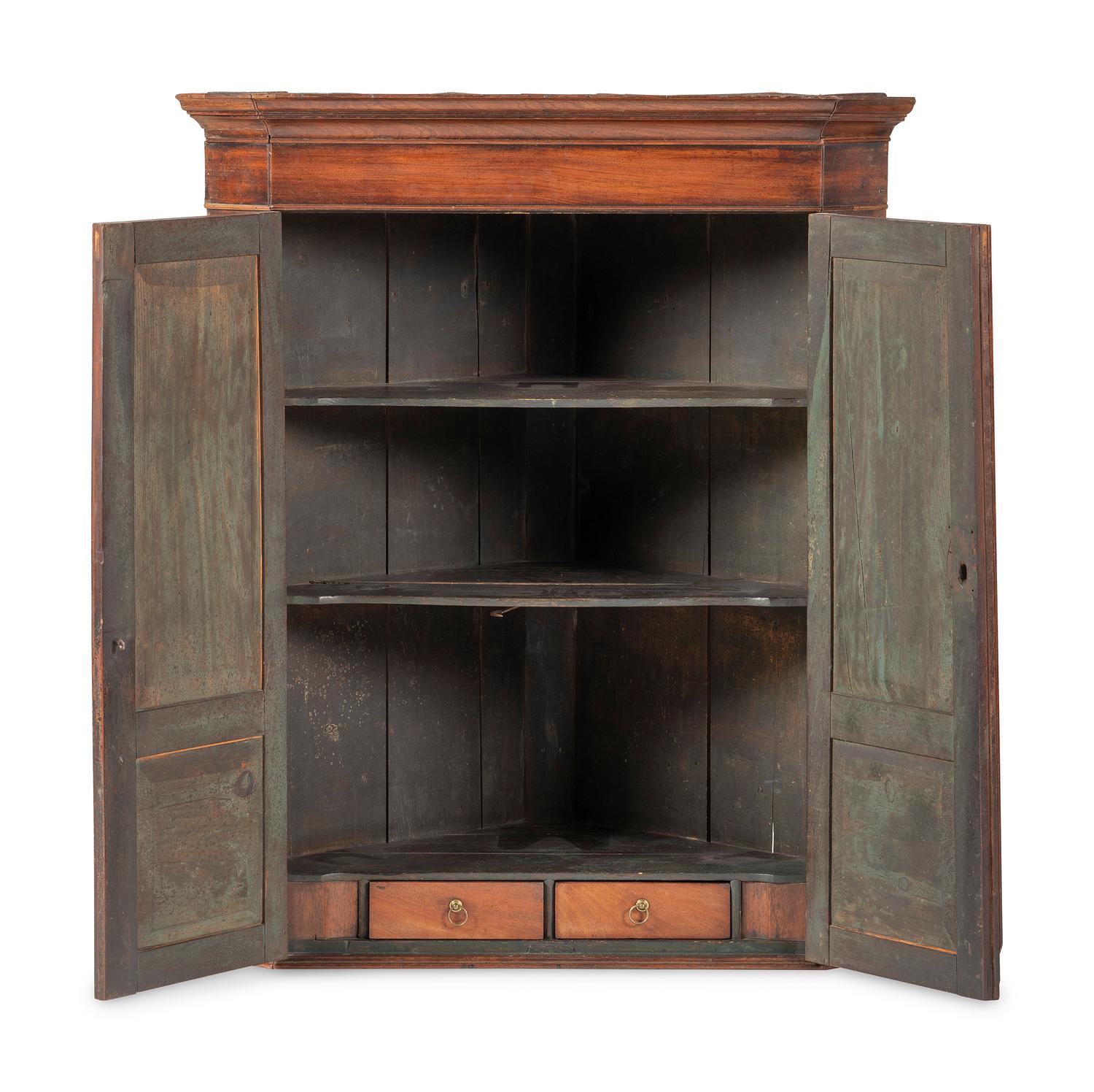 A Chippendale Figured and Paneled Mahogany Hanging Corner Cabinet