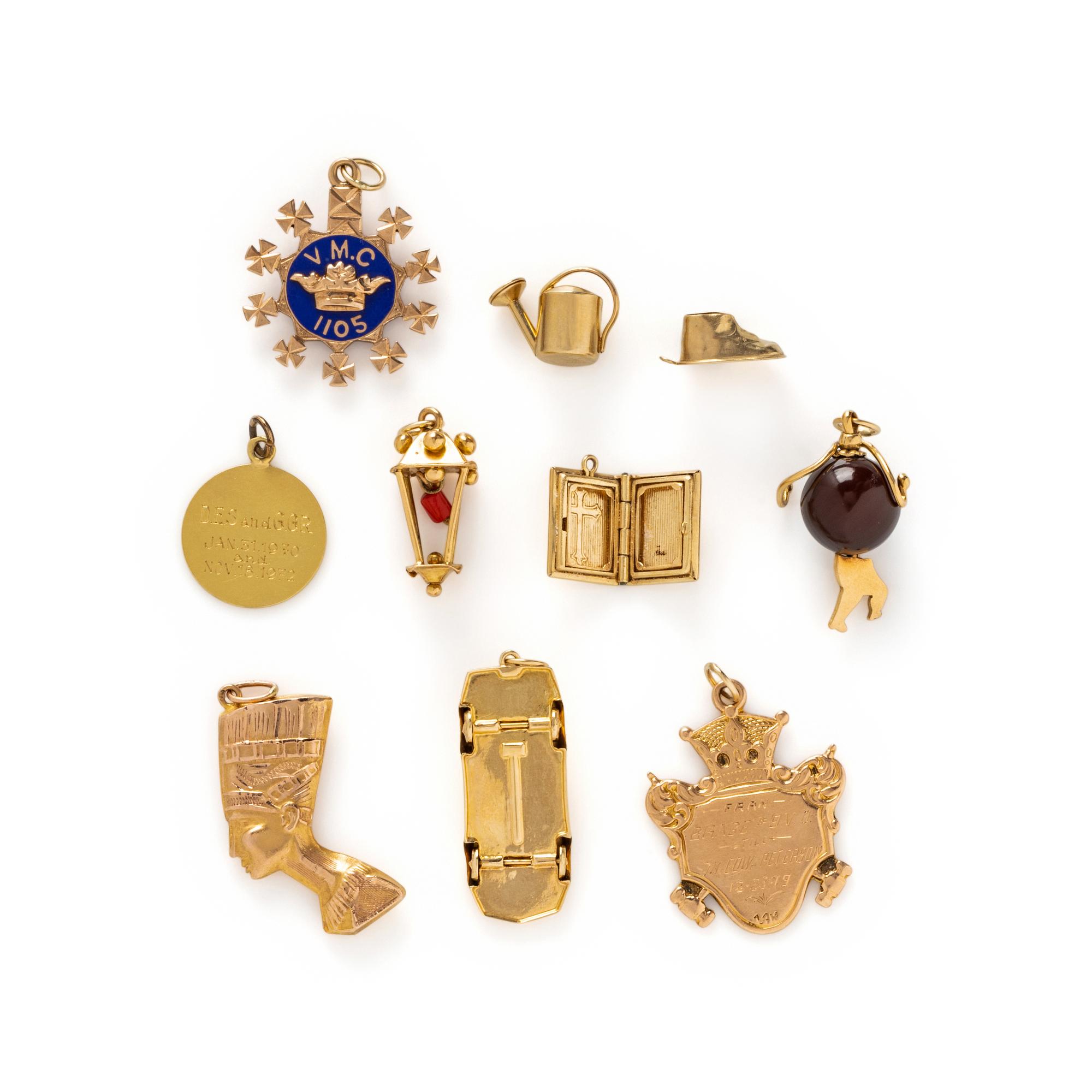COLLECTION OF YELLOW GOLD CHARMS