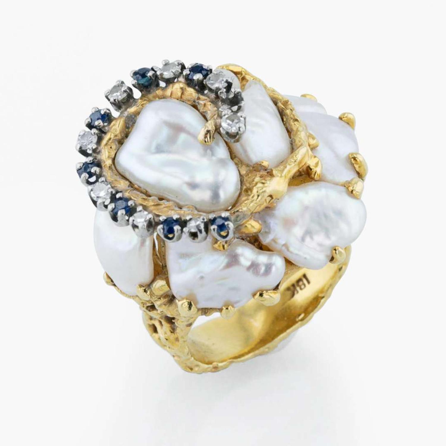An 18K yellow gold, baroque cultured pearl, diamond, and sapphire ring