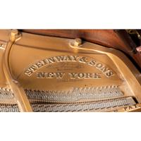 A Steinway and Sons Louis XV Style Walnut Grand Piano