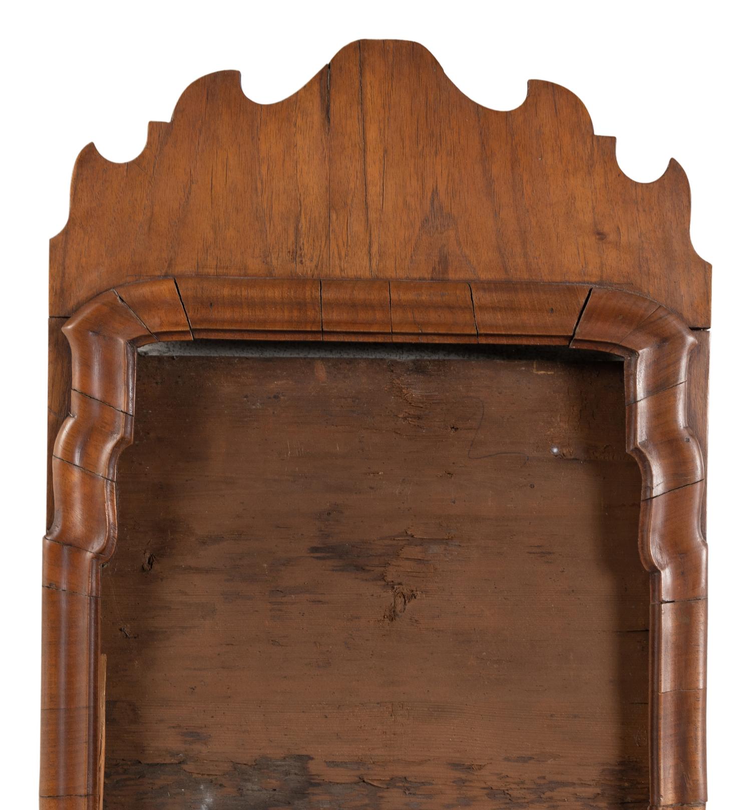 A Queen Anne Walnut Mirror