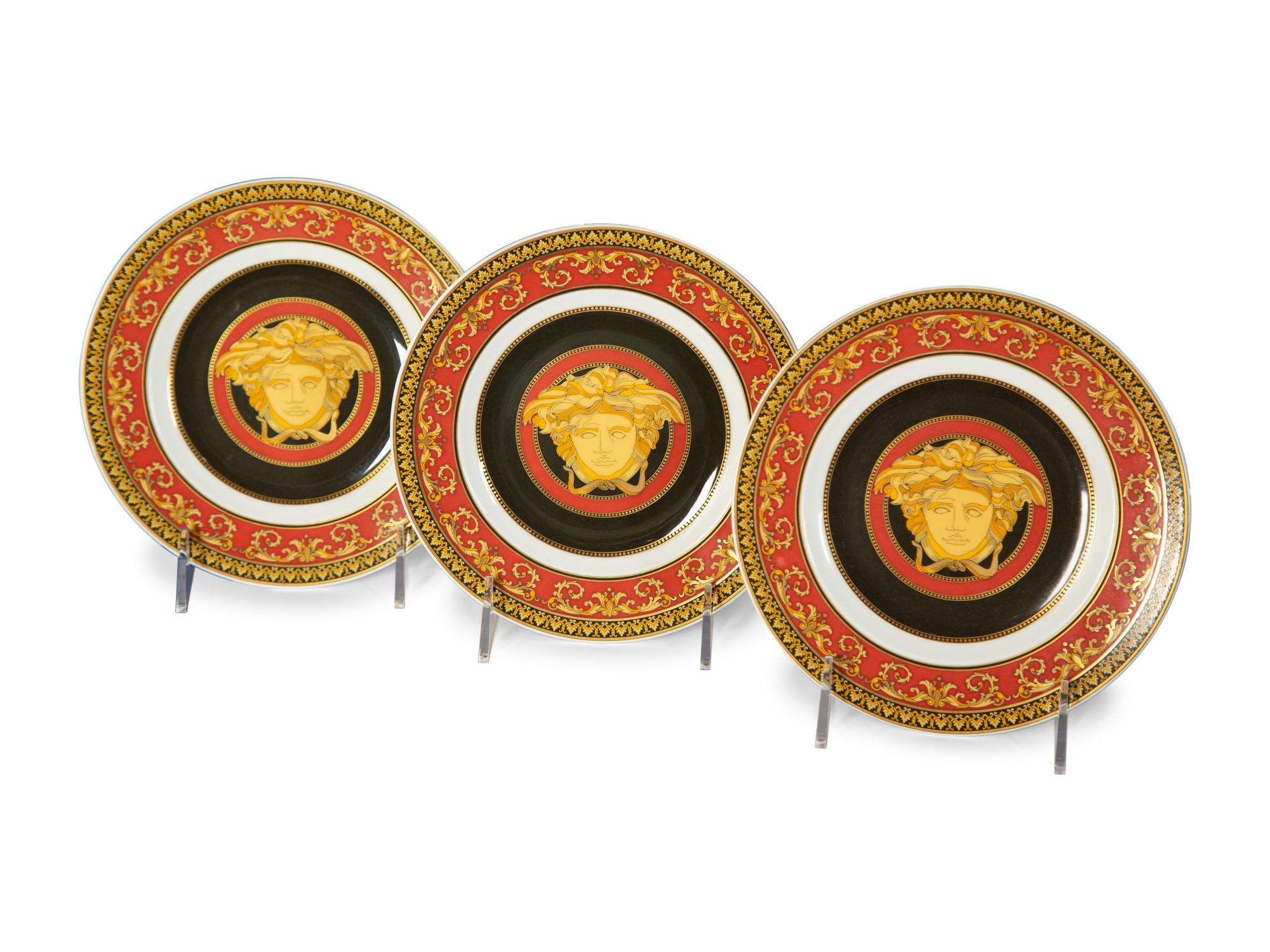 A Versace Porcelain Medusa Red Dinner Service