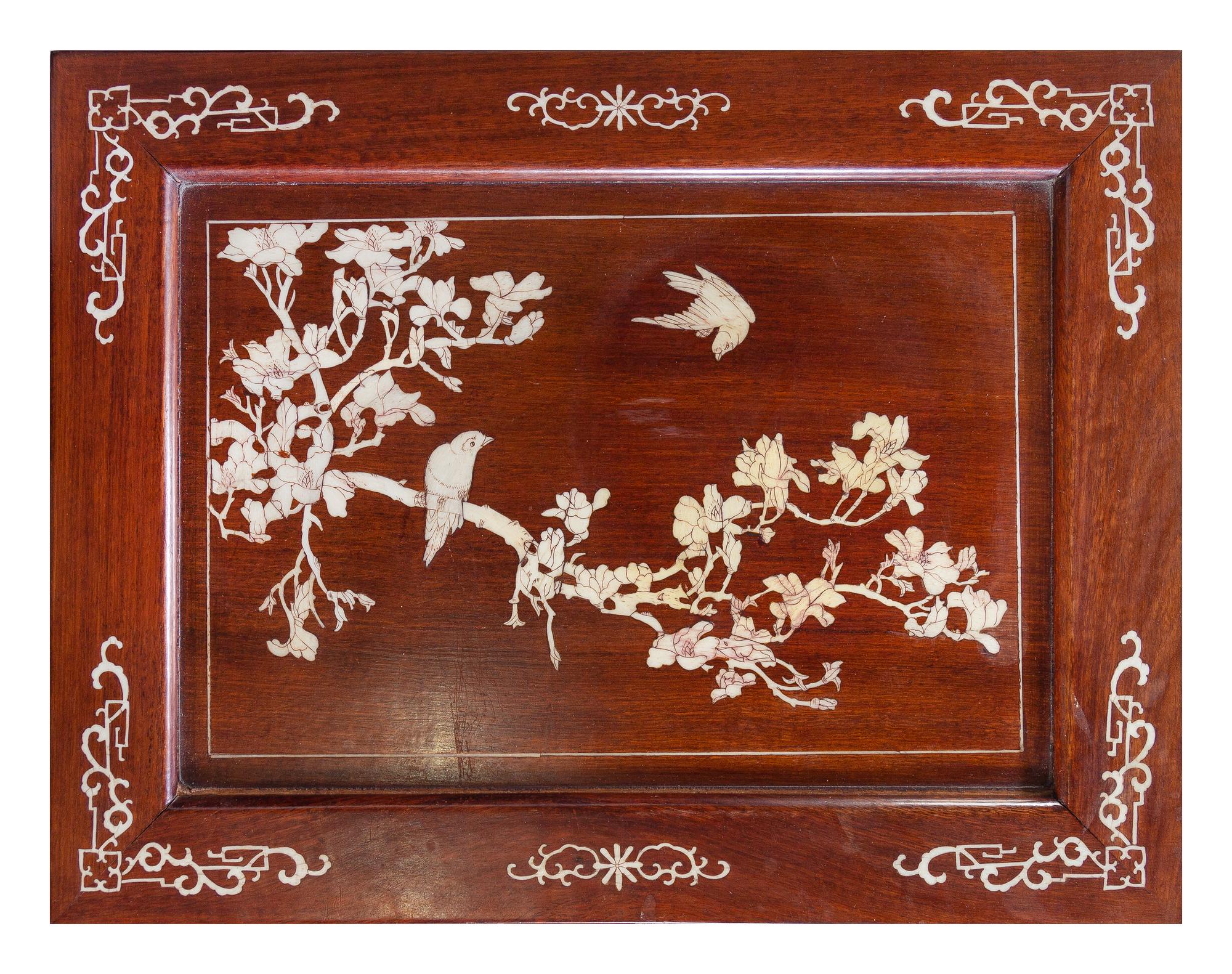 A Set of Four Chinese Hardwood Nesting Tables