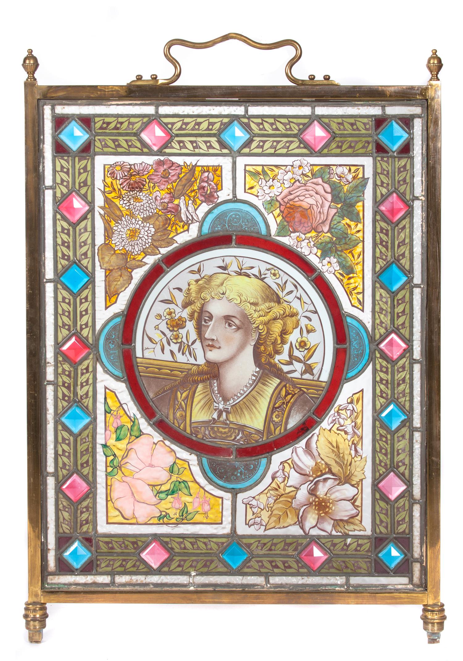 A Victorian Stain Leaded and Jewel Glass Fire Screen Height 33 1/2 x width 20 1/2 inches.