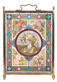 A Victorian Stain Leaded and Jewel Glass Fire Screen Height 33 1/2 x width 20 1/2 inches.