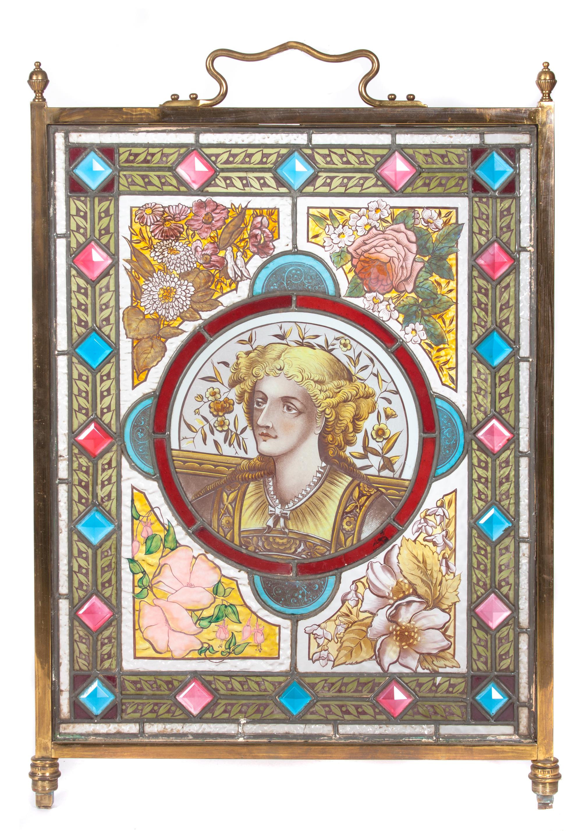 A Victorian Stain Leaded and Jewel Glass Fire Screen Height 33 1/2 x width 20 1/2 inches.