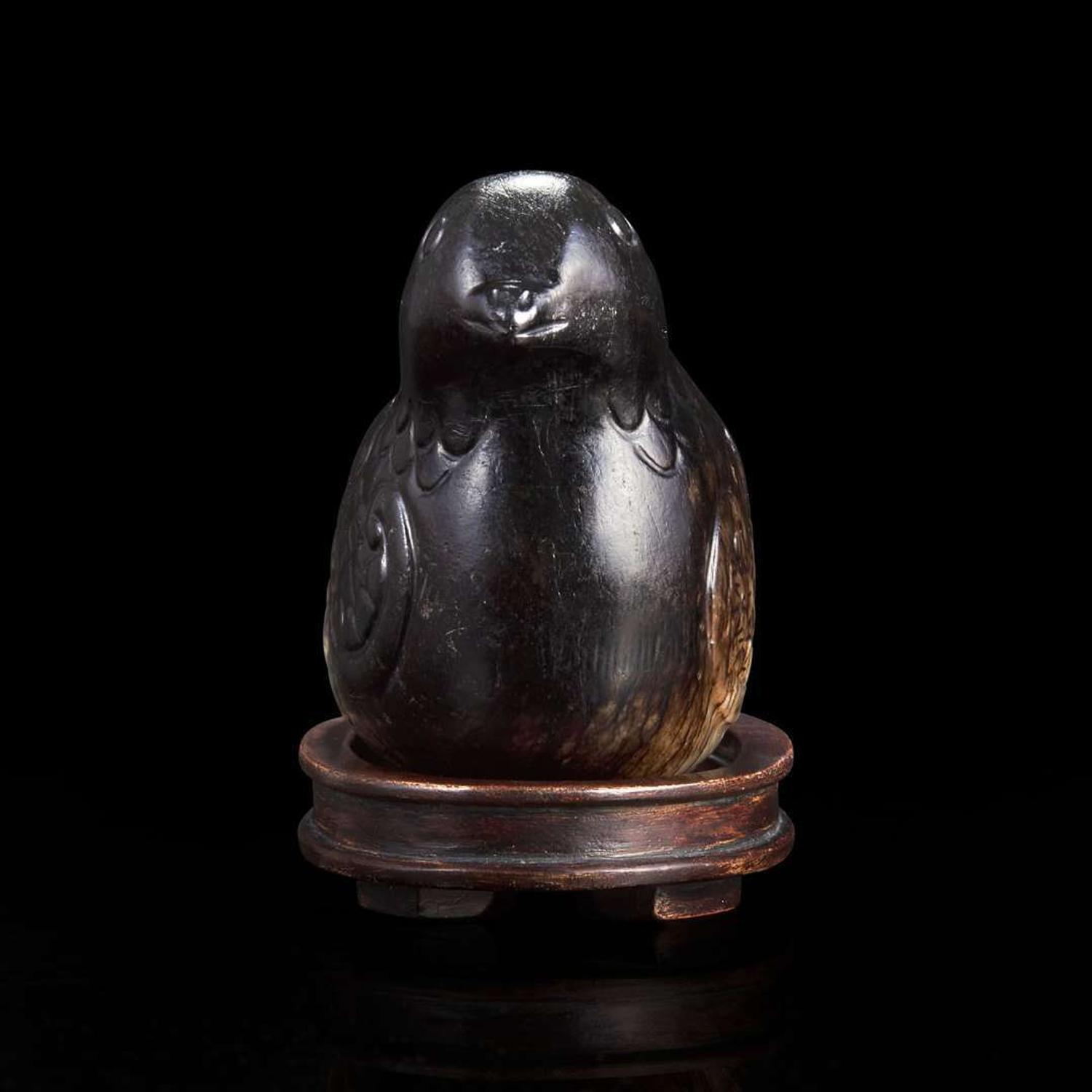 A Chinese dark blackish-brown and grey jade carving of a quail 玉雕鹧鸪 Ming to early Qing dynasty ????