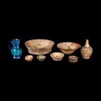 Eight Western Asiatic and Greco-Roman Terracotta, Alabaster, and Blue Glass Vessels
