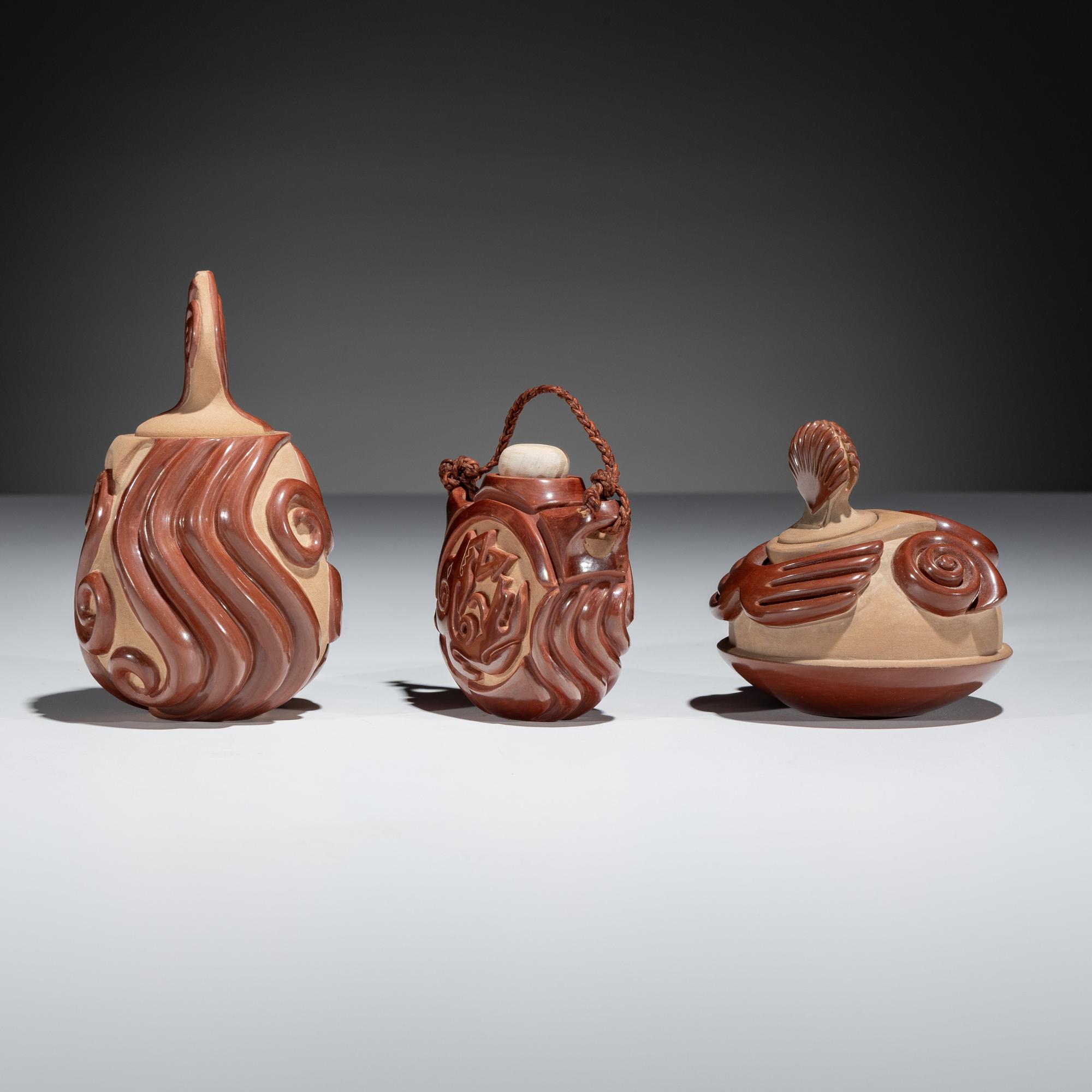 Red and Tan Carved Miniature Pottery