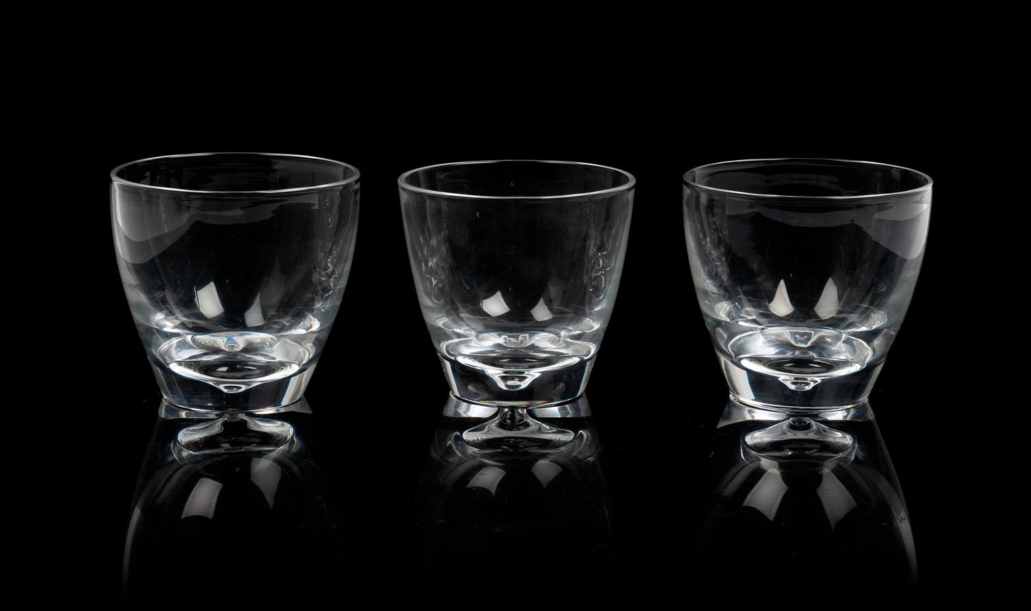 A Set of Seven Steuben Glass Tumblers Height 3 1/2 inches.