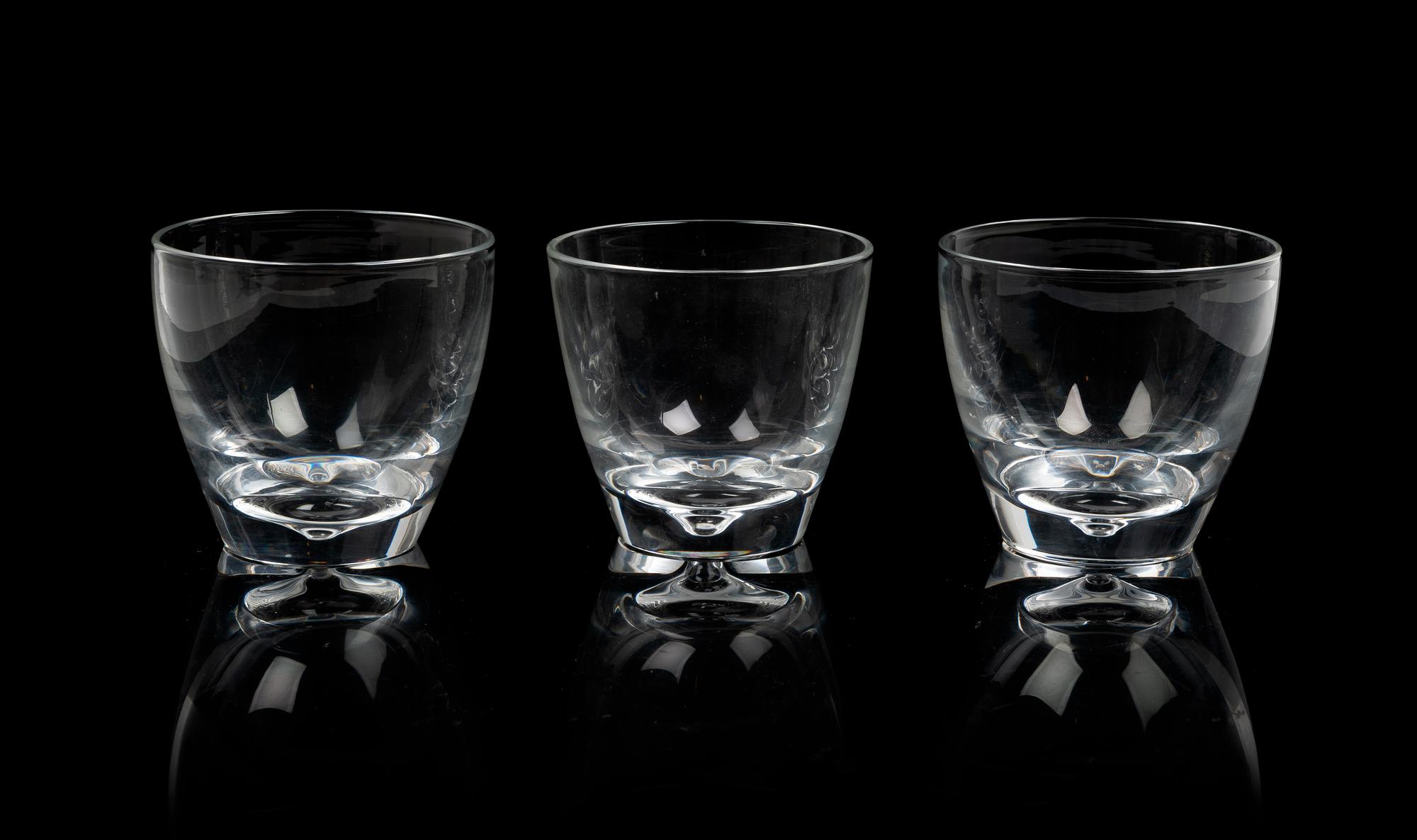 A Set of Seven Steuben Glass Tumblers Height 3 1/2 inches.